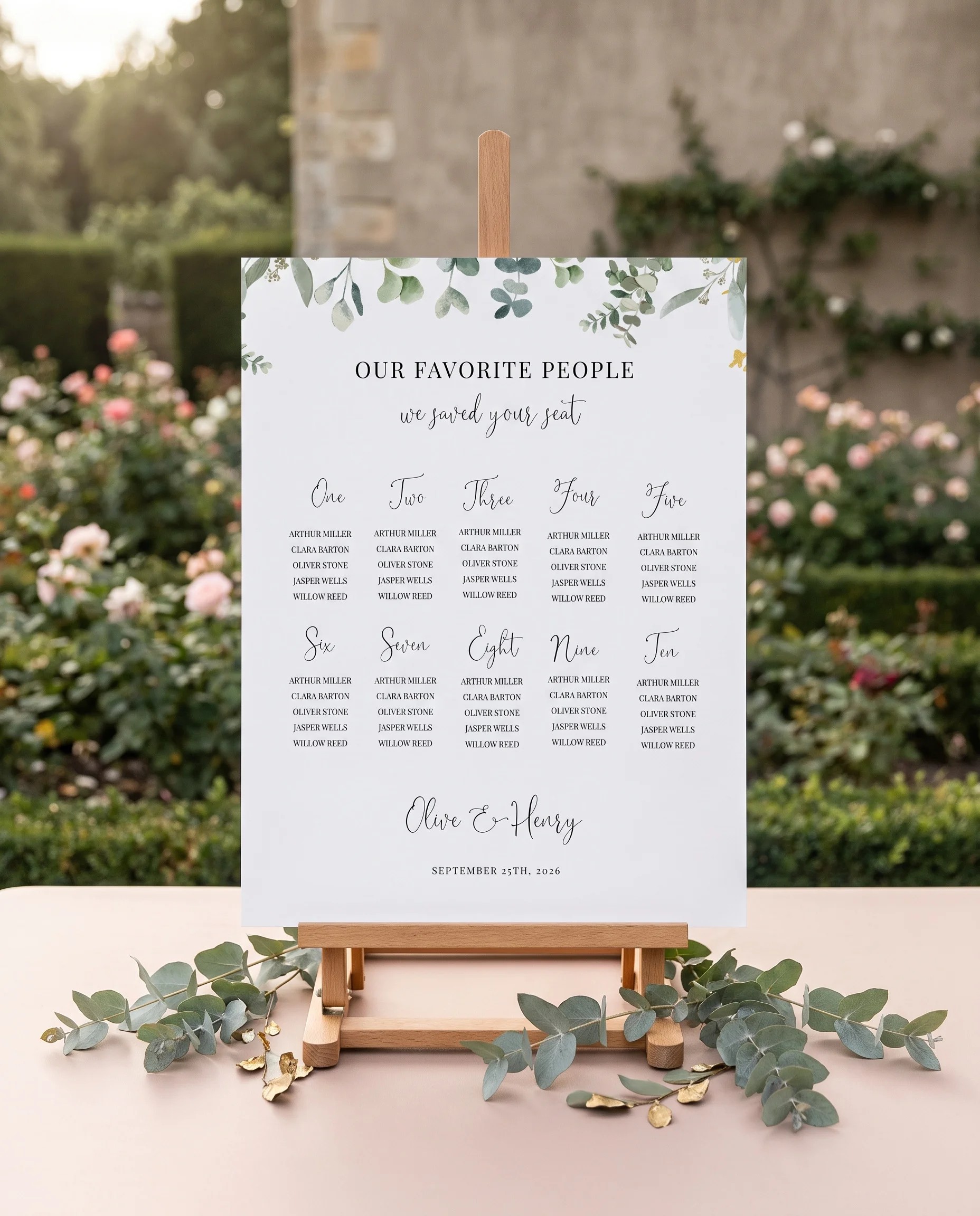 Eucalyptus Gold wedding seating chart — displayed on an easel under soft natural light, wedding seating chart.