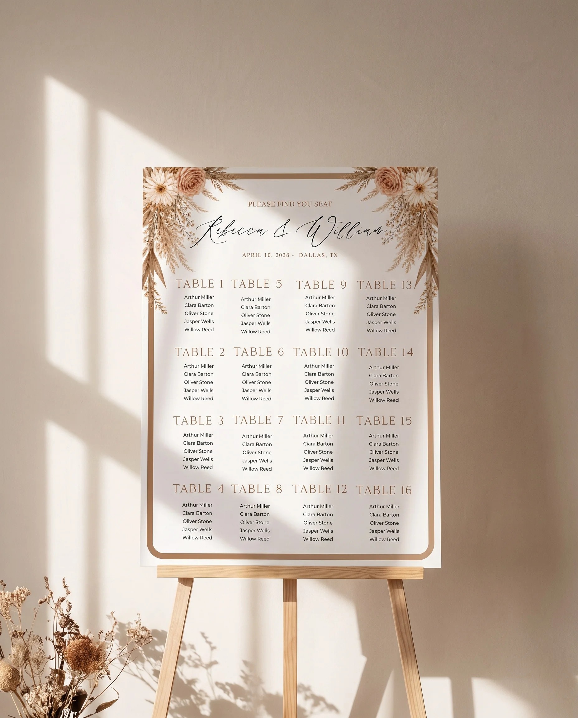 Pampas Hush wedding seating chart — single page displayed on an easel under soft natural light, wedding seating chart