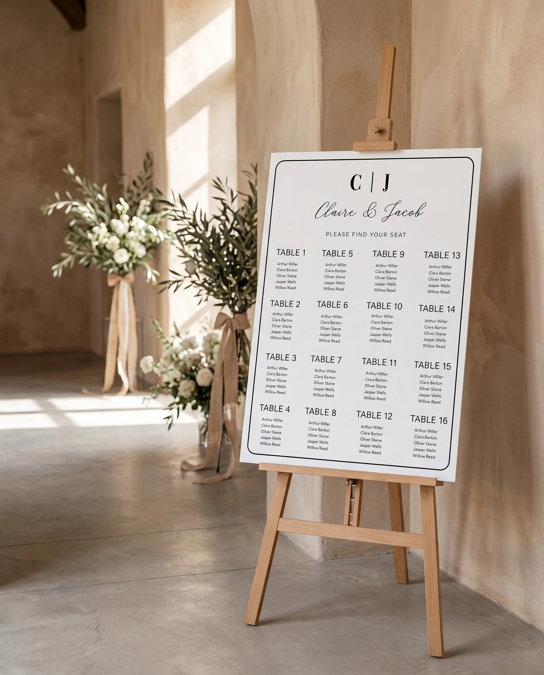 Lyris wedding seating chart — displayed at a reception entrance under soft natural light with a slight overhead angle, seating chart template