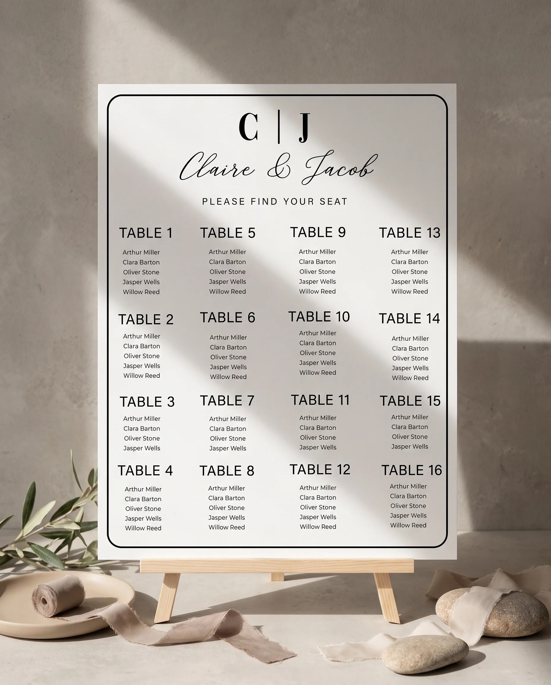 Lyris wedding seating chart — displayed on an easel under soft natural light with a slight overhead angle, wedding seating chart