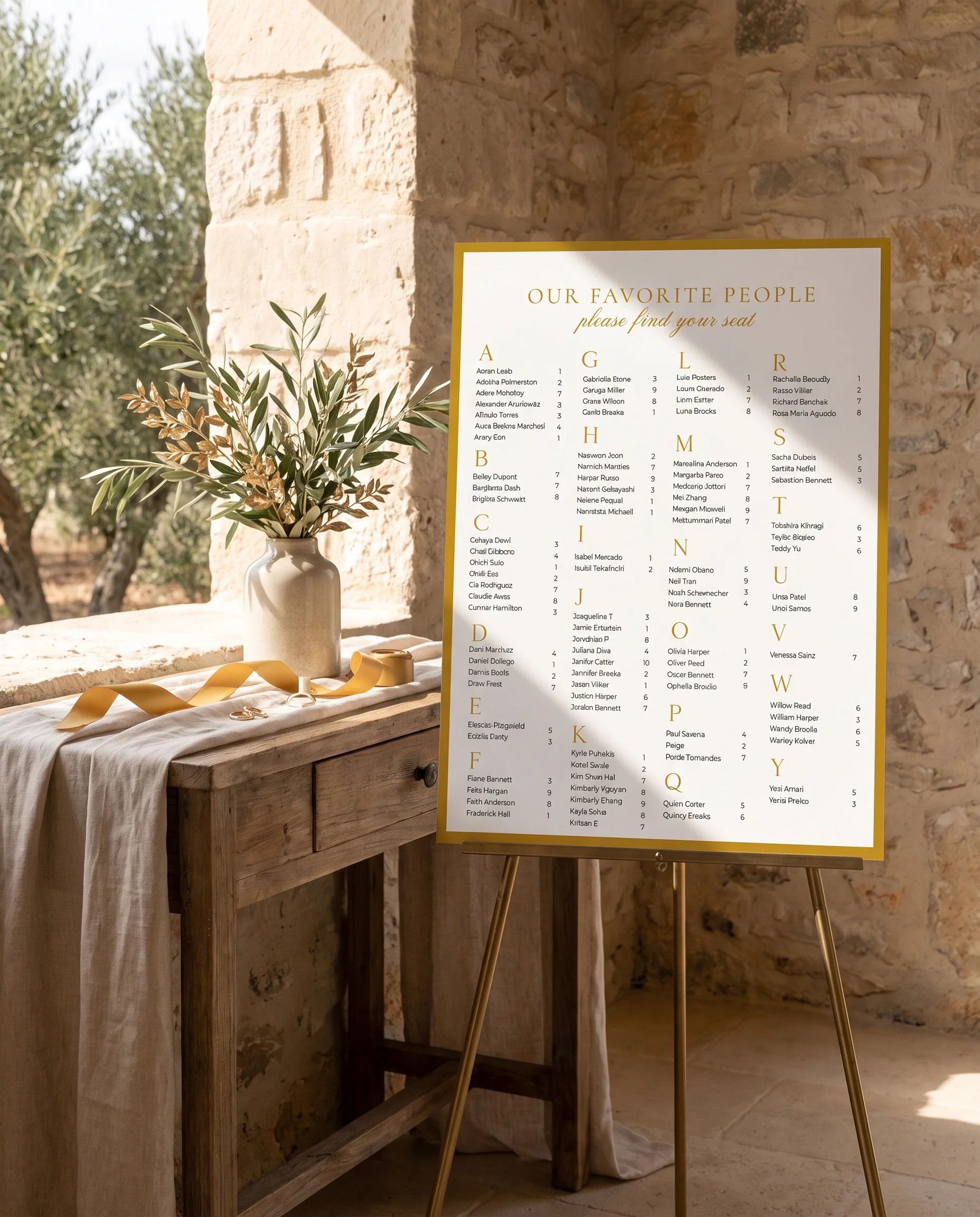 Gilded Arrow wedding seating chart — single page shown beside furniture for scale under soft natural light, wedding seating chart template