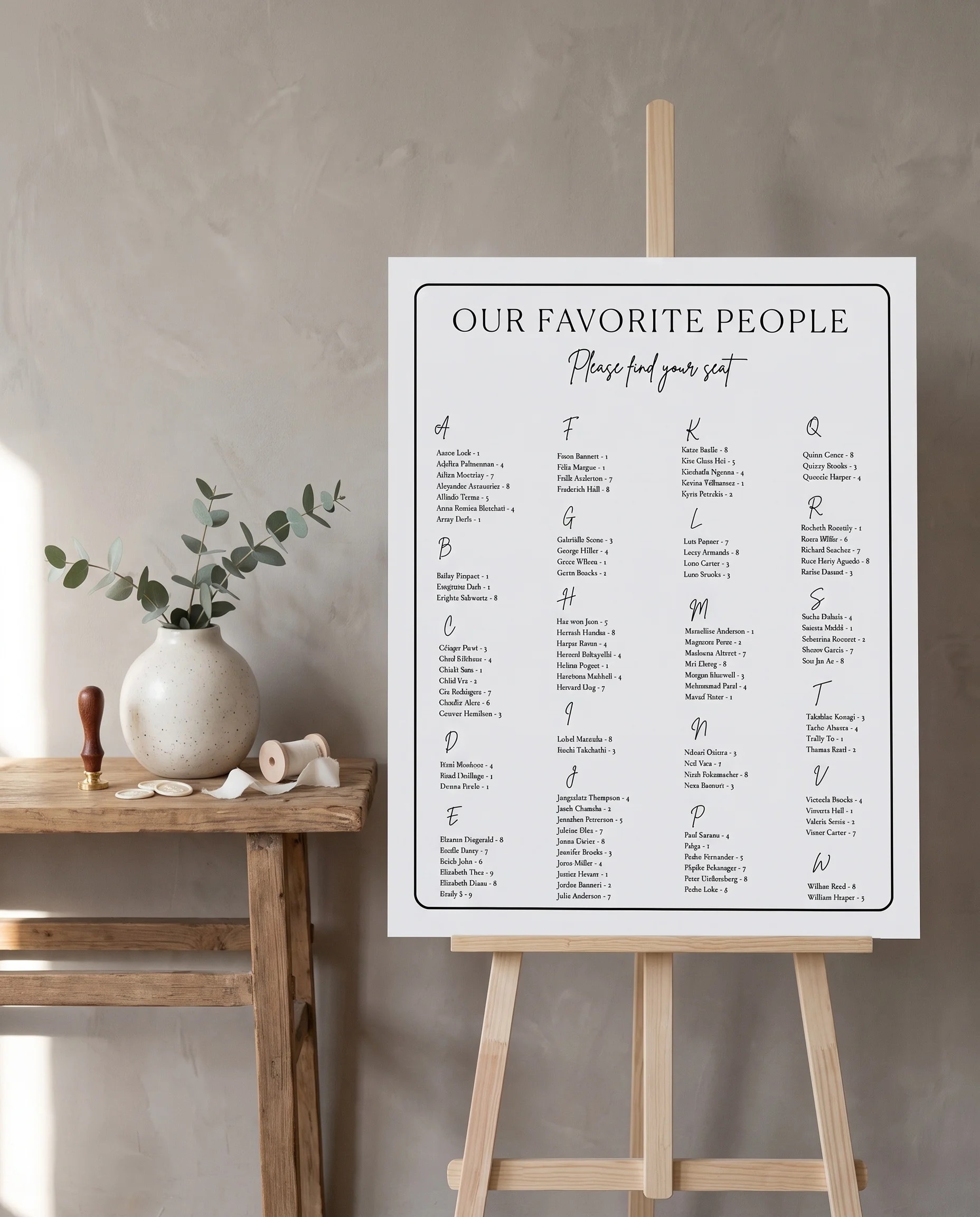 Contour wedding seating chart — single page shown beside furniture for scale under soft natural light, wedding seating chart template