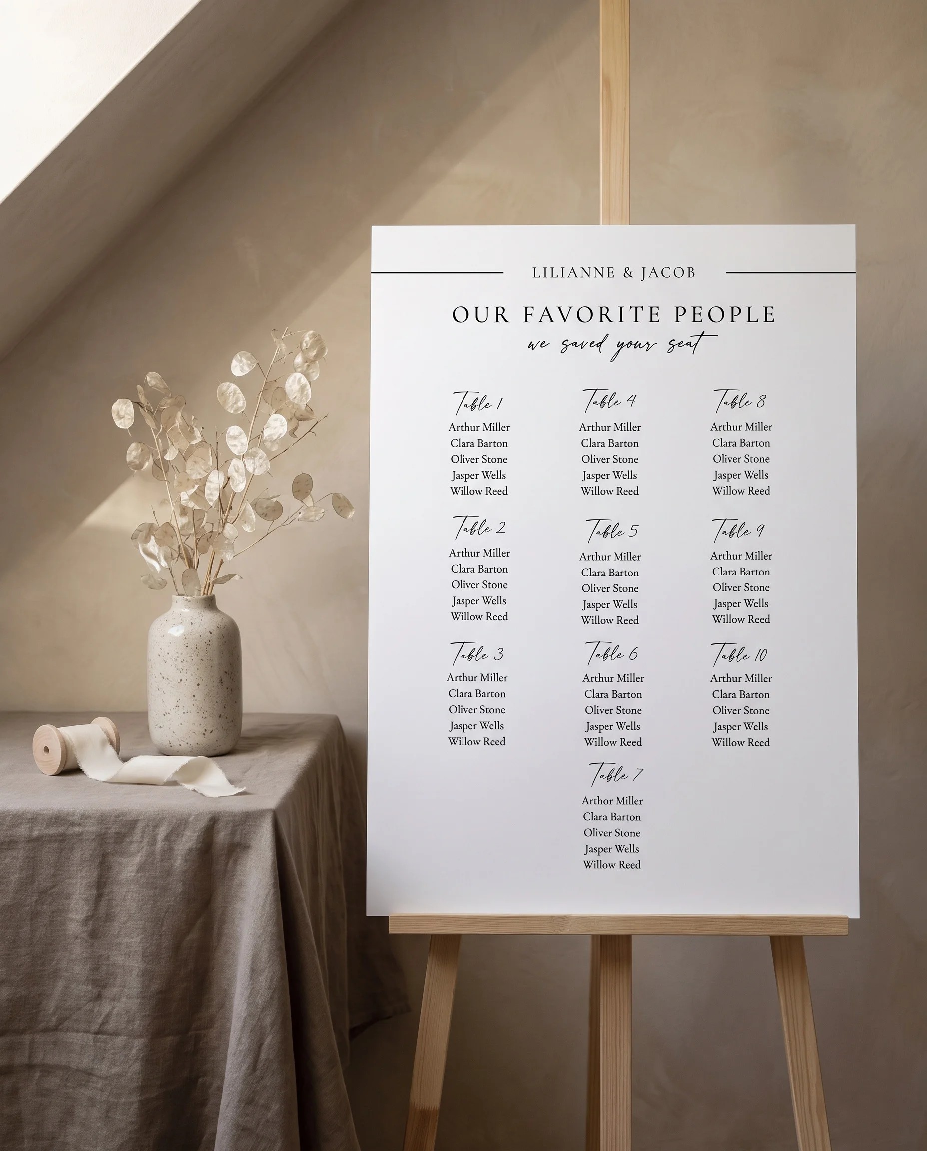 Tonal Reply wedding seating chart — shown beside furniture for scale under soft natural light, wedding seating chart template.