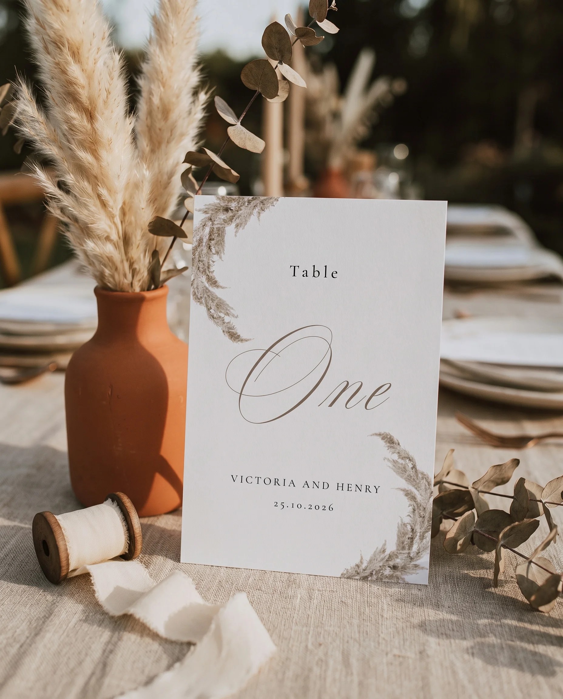 Pampas wedding table number — standing upright on a dressed table under soft natural light, table numbers wedding