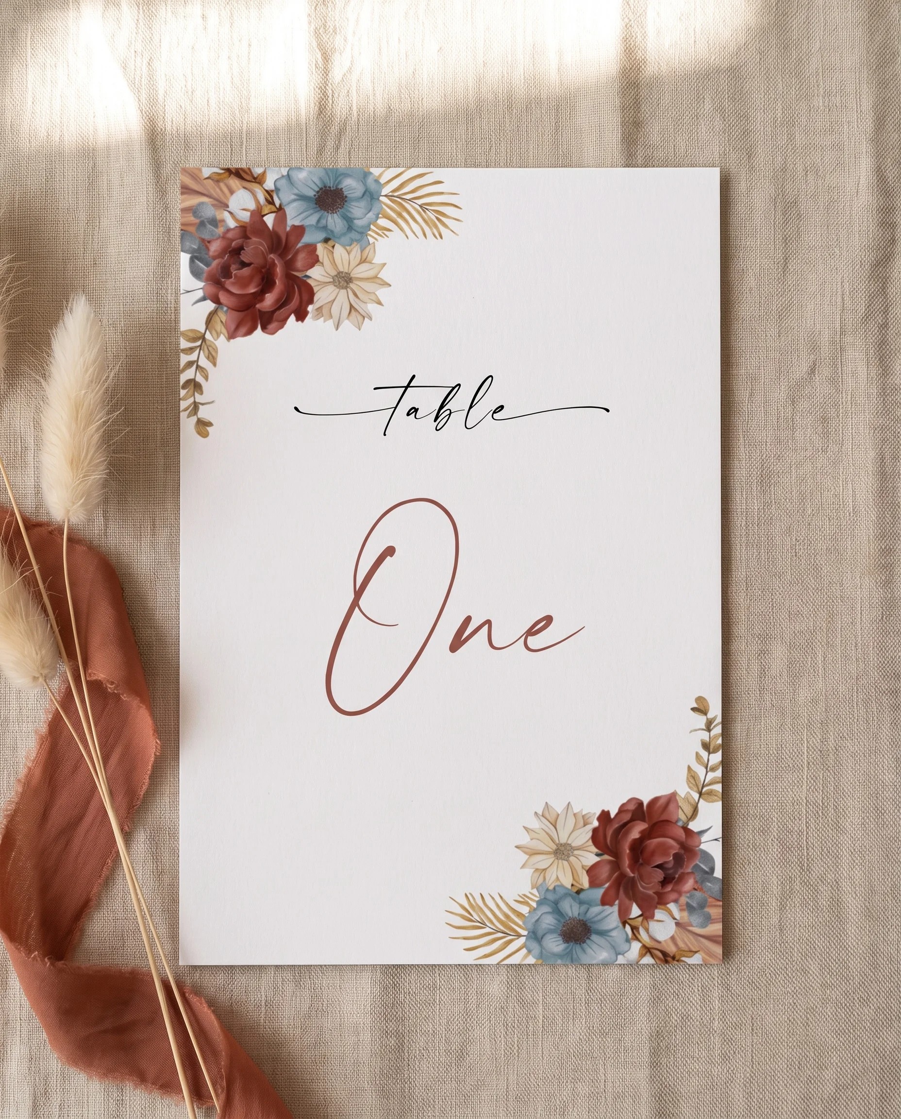 Marisol Bloom wedding table number — shown flat under soft natural light at a slight overhead angle, wedding table numbers
