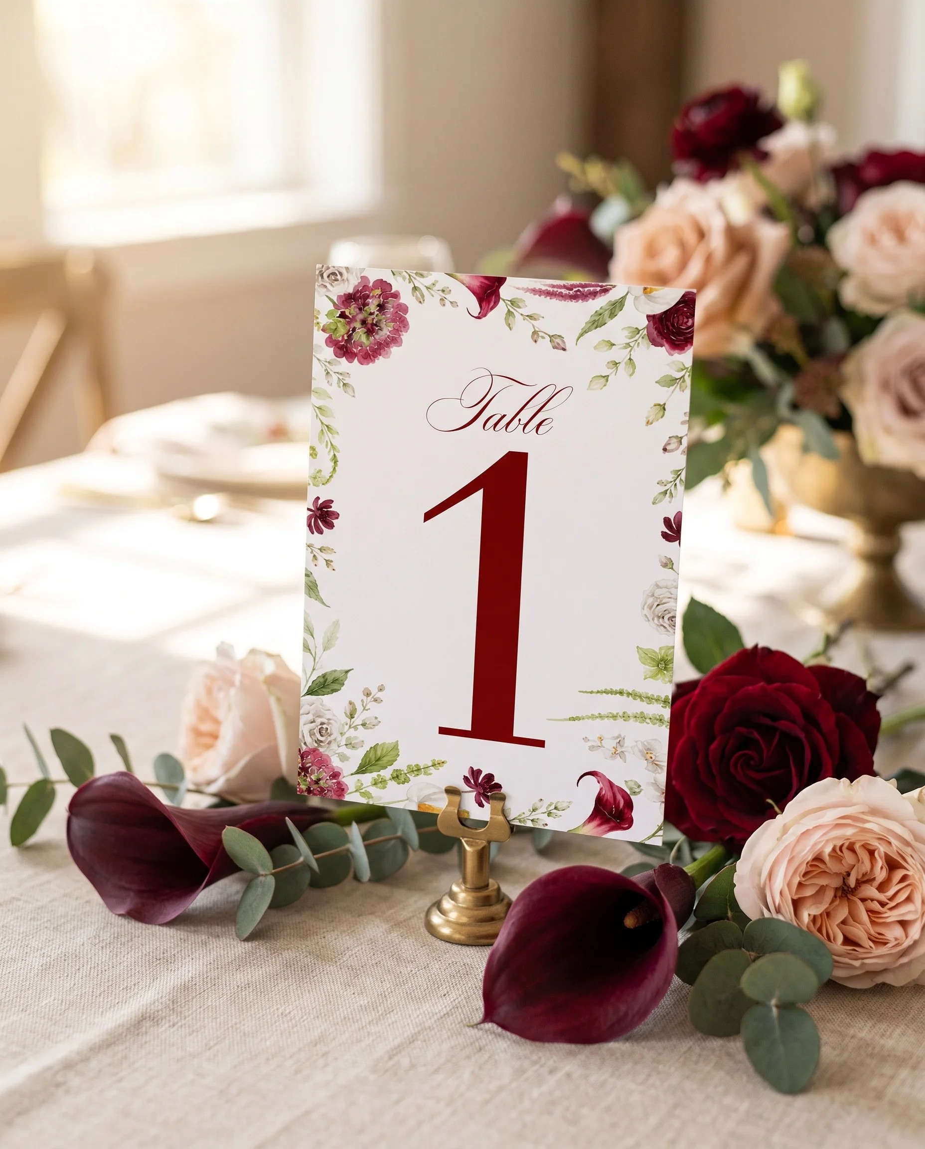 Burgundy Calla wedding table number — standing upright on a dressed table under soft natural light, table numbers wedding.