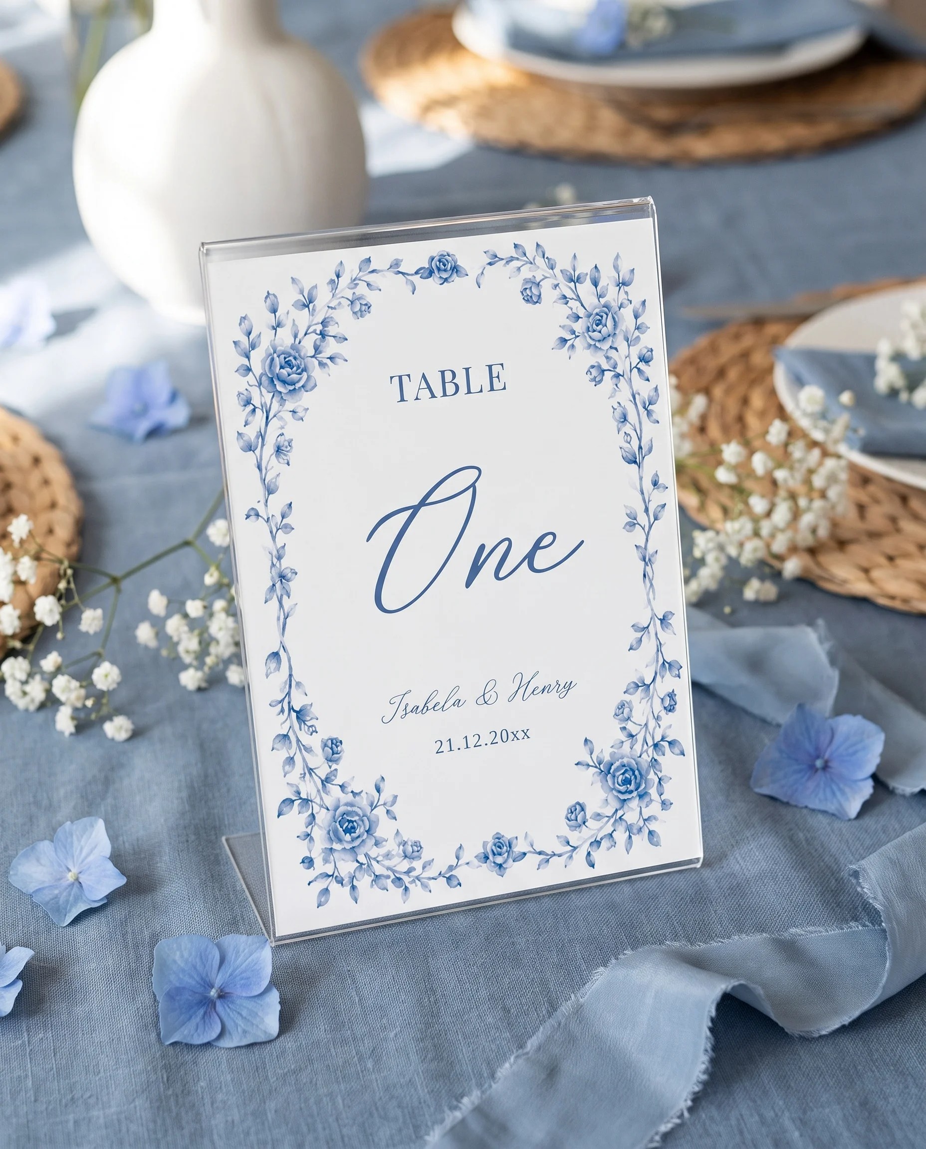 Blue Heron wedding table number — standing upright on a dressed table in soft natural light, table numbers wedding