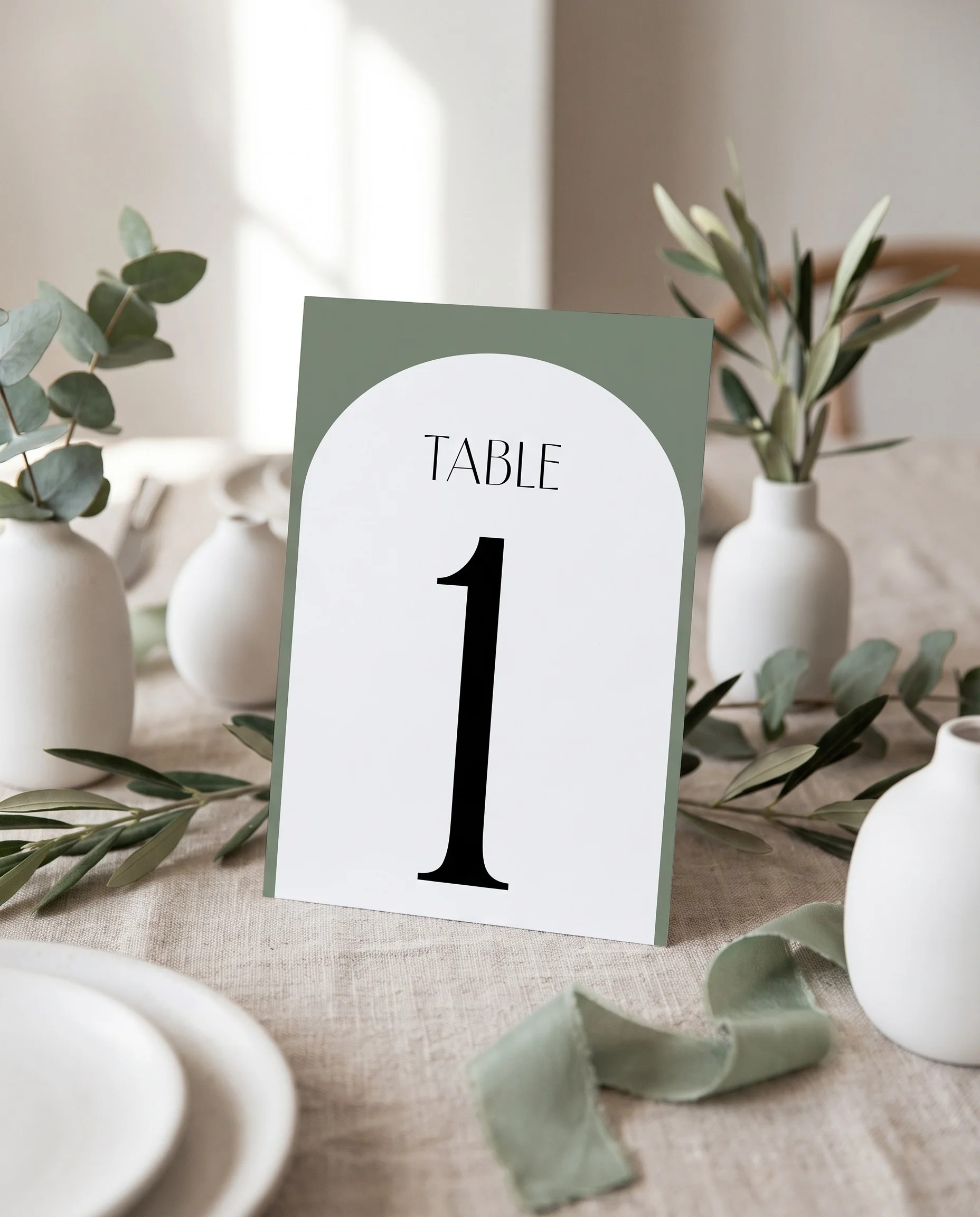 Arc Vale wedding table number — standing upright on a dressed table under soft natural light, table numbers wedding.