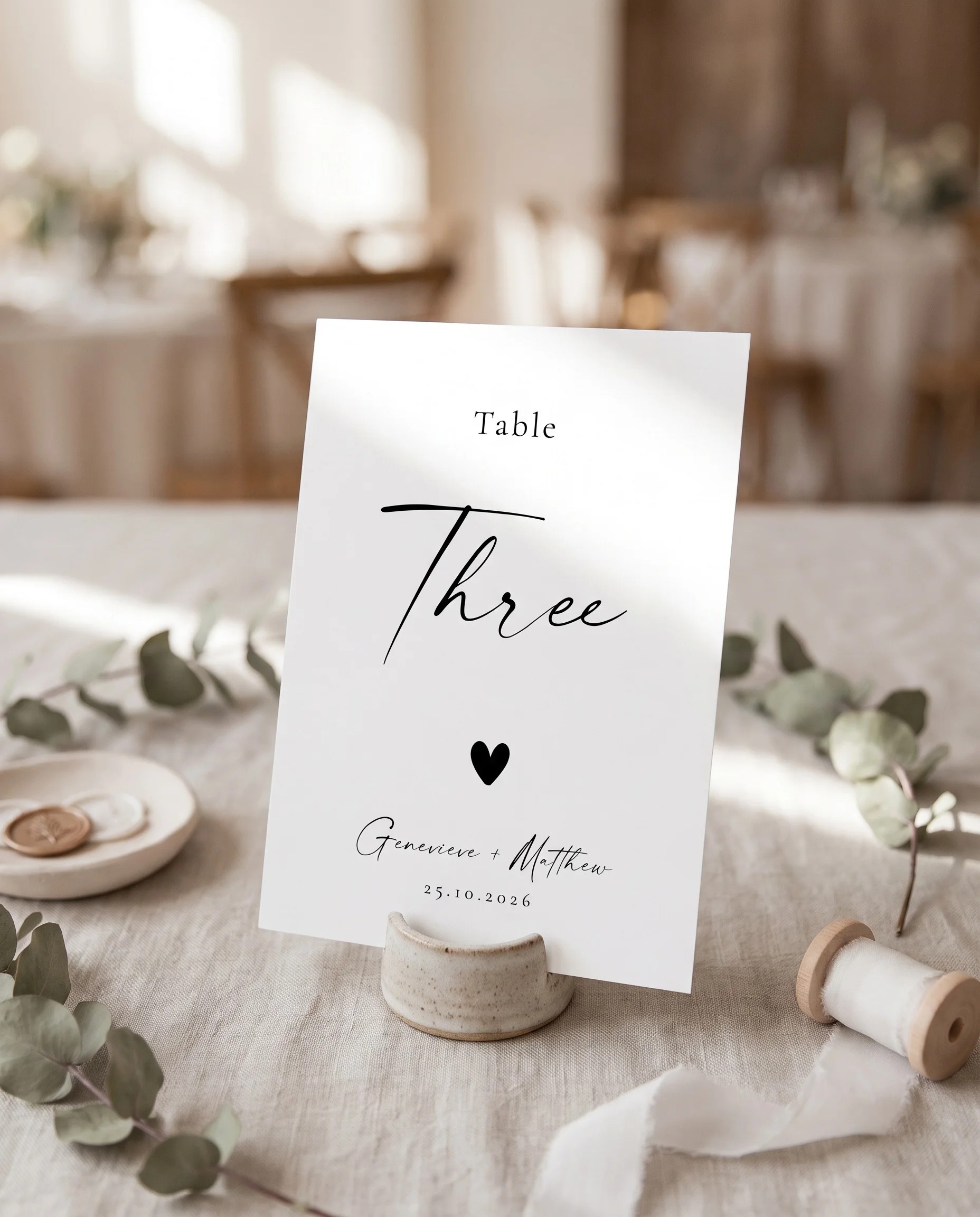Arcadia wedding table number — standing upright on a dressed table under soft natural light, table numbers wedding