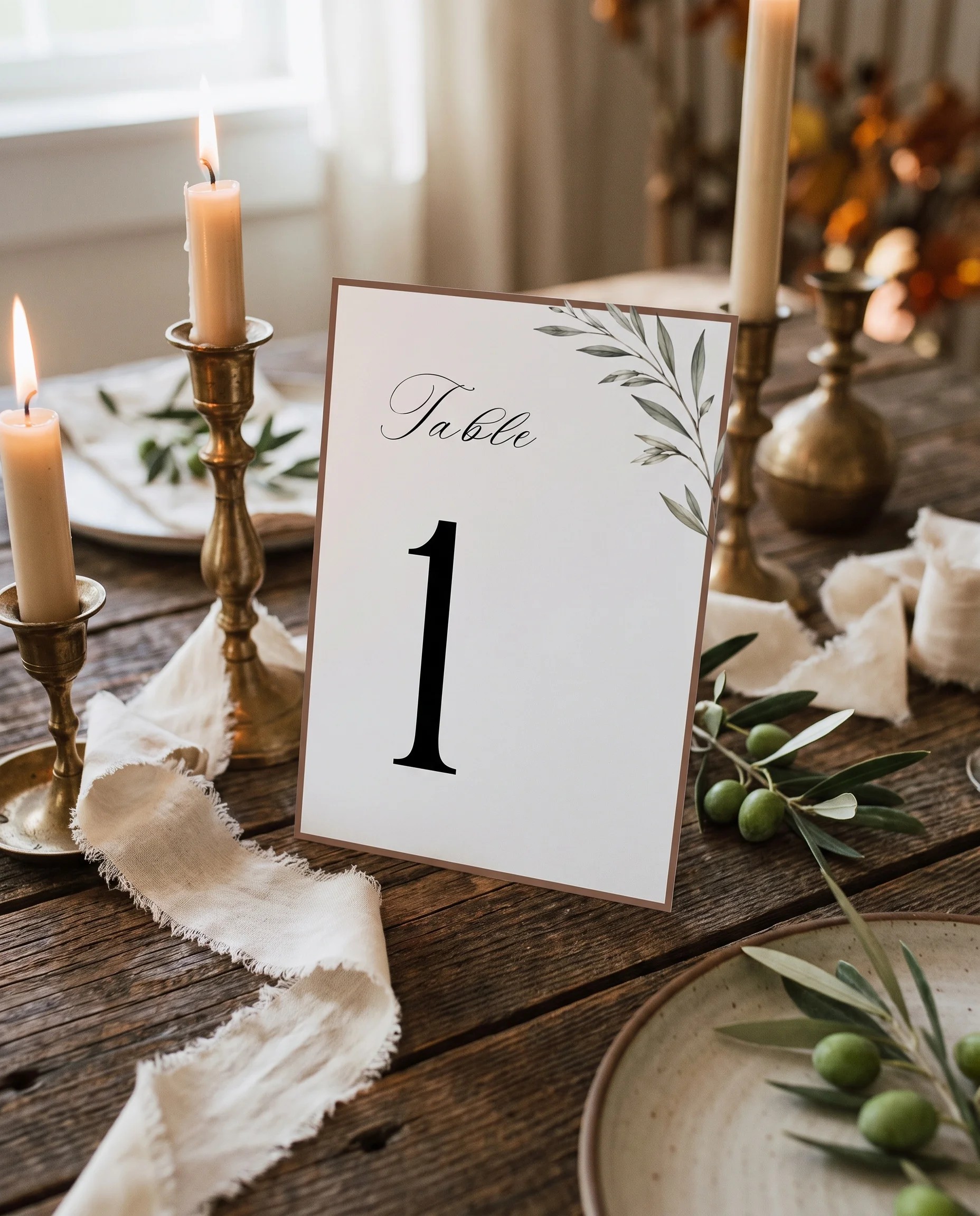 Olive Arc wedding table number — standing upright on a dressed table under soft natural light, elegant table numbers wedding.
