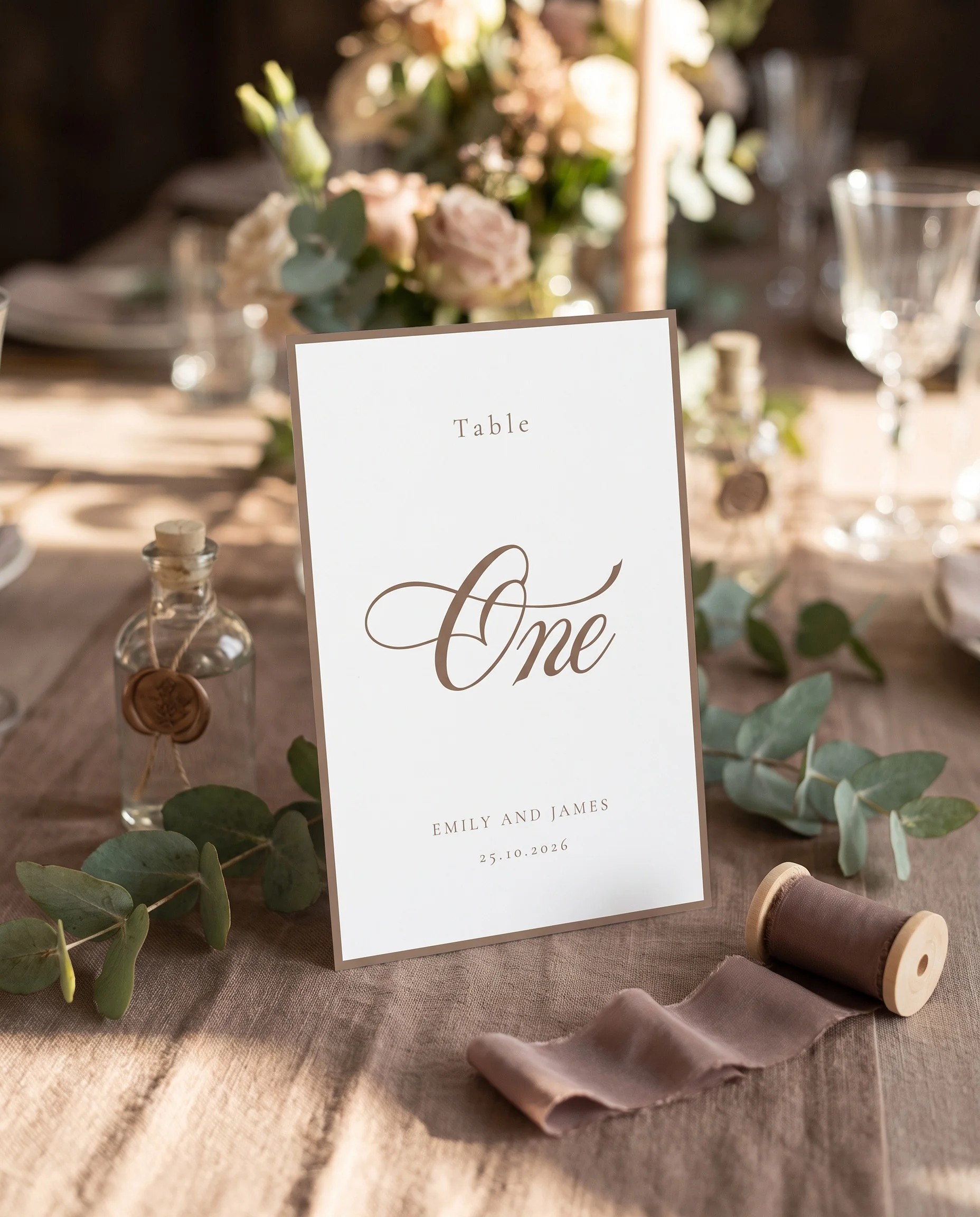 Hinge Script wedding table number — standing upright on a dressed table under soft natural light, table numbers wedding.
