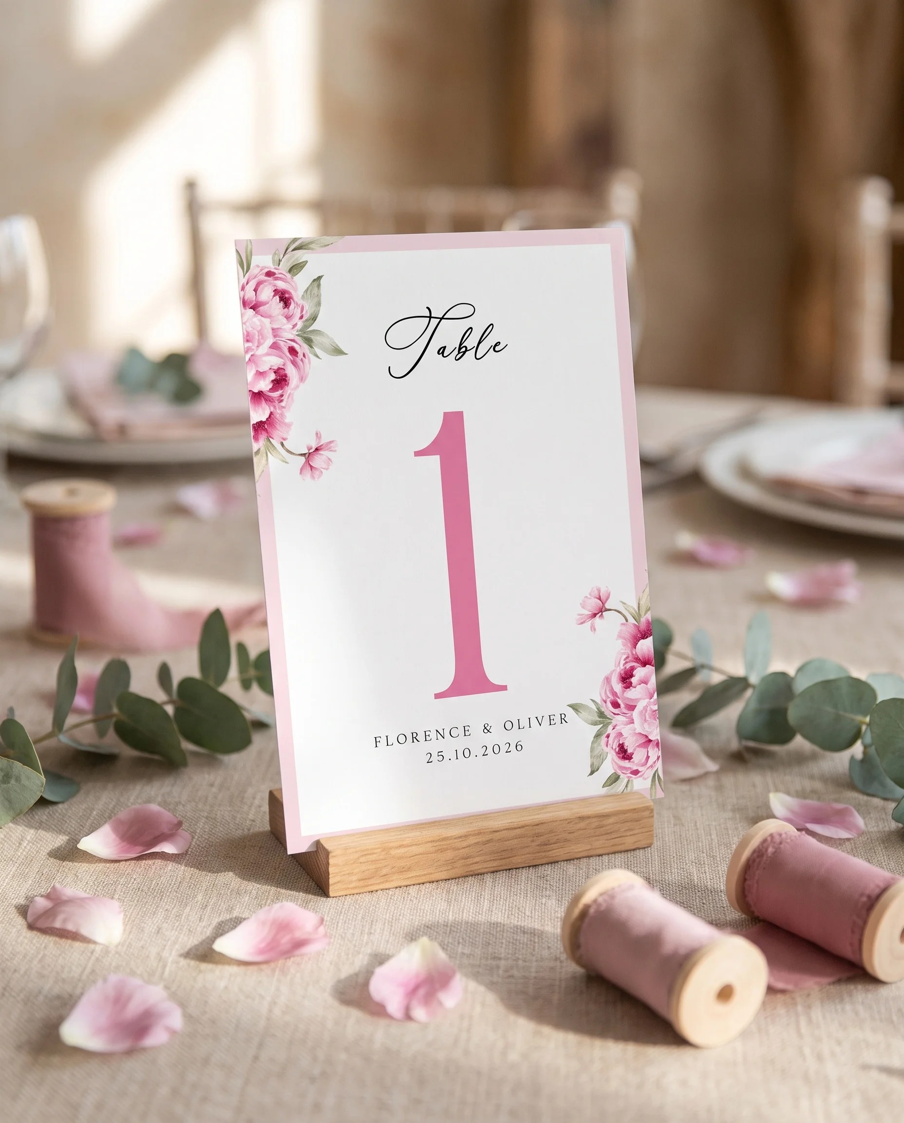Blush Peony wedding table number — standing upright on a dressed table in soft natural light, table numbers wedding.