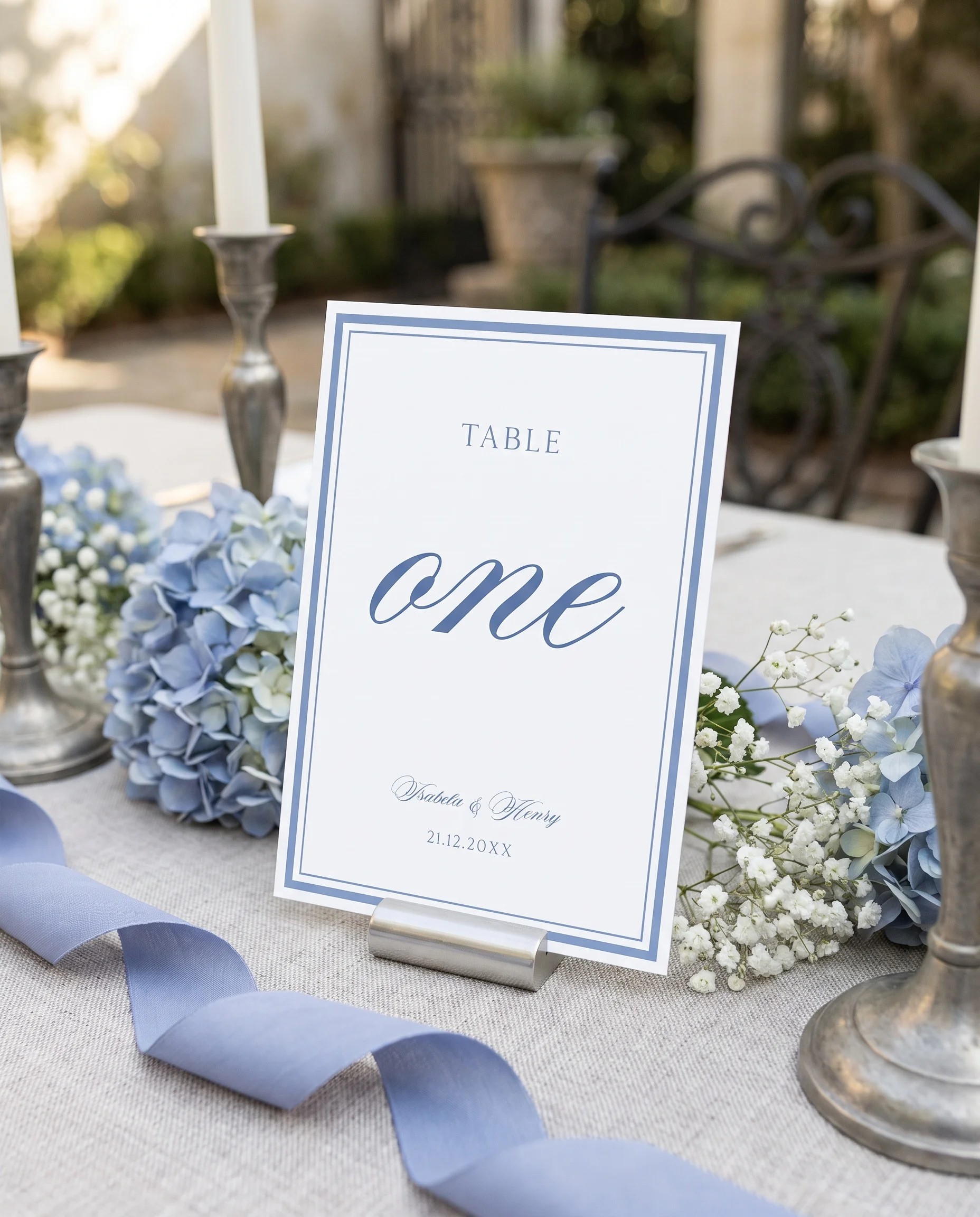 Azure Flourish wedding table number — standing upright on a dressed table under soft natural light, table numbers wedding.